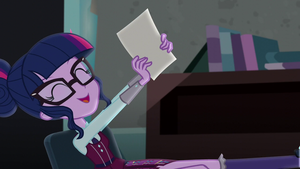  Sci Twi leaning backwards in her chair EG3