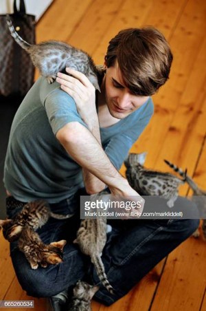 Man And His Kittens