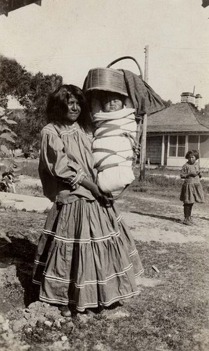  Apache Woman and baby in a Tsoch (Apache Cradle) 1931