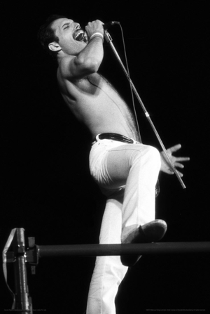  Freddie Mercury performs on stage at the Elland Road Football Stadium (Leeds, UK on May 29, 1982)