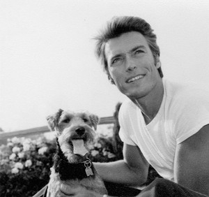 Clint Eastwood photographed with his beloved Airedale Terrier (1960)