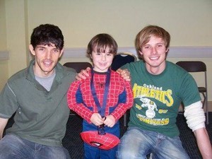  Bradley James and Colin morgan with young shabiki 😊