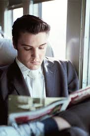 Elvis Catching Up On Some Reading
