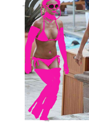 Britney Spears all dressed in shockingly bright pink and smoking a shockingly bright pink cigarette