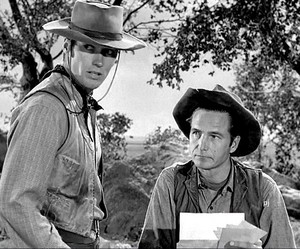  Clint Eastwood as Rowdy Yates and Eric Fleming as Gil Favor in Rawhide