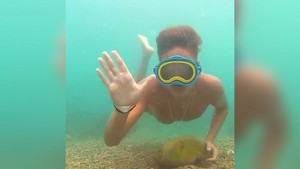 Nikita "Xlson137" Tretyak swims underwater in Crimea