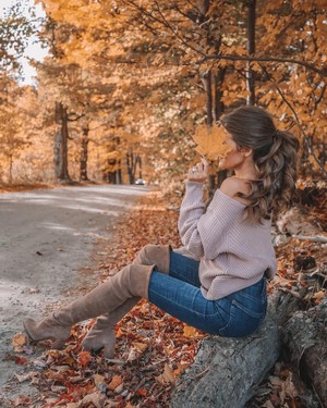  Girl Holding Fall Leaves