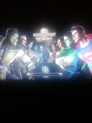  Mortal Kombat vs. DC Universe (Loading Screen)