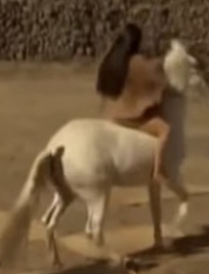  Erendira riding an White Horse