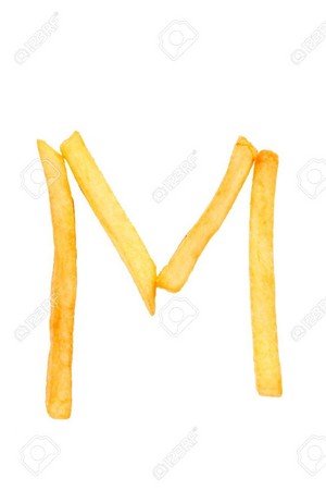 Alphabet letter m from french fries on the white