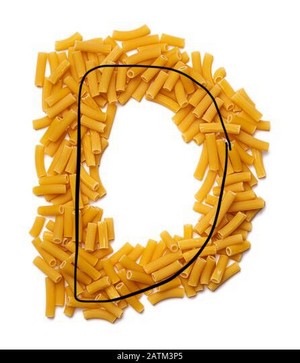  Letter D of the English alphabet from dry pasta, tambi on a white