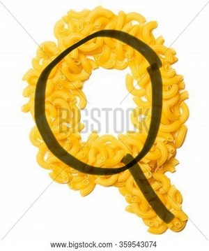  Letter Q of the English alphabet from dry pastas, pasta on a white