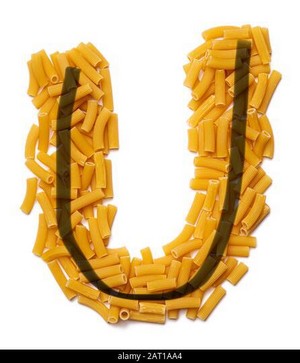  Letter U of the English alphabet from dry pasta on a white