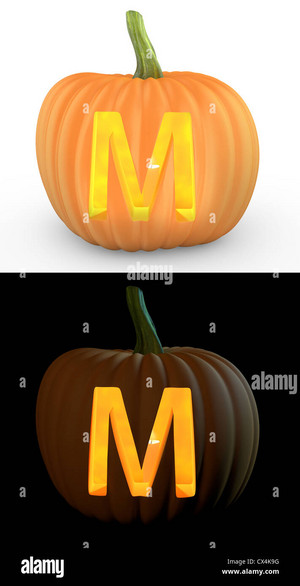 M Letter Carved On Pumpkin Jack Lantern Isolated On And White