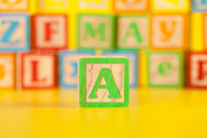 Photograph Of Colorful Wooden Block Letter A