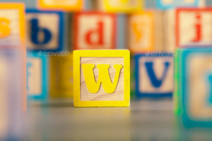 Photograph Of Colorful Wooden Block Letter W