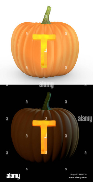 T Letter Carved On Pumpkin Jack Lantern Isolated On And White