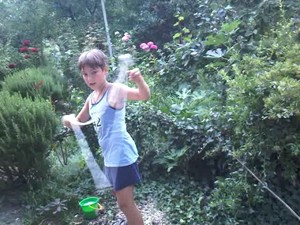  Nikita 'Xlson137' plays with soap bubbles in the garden