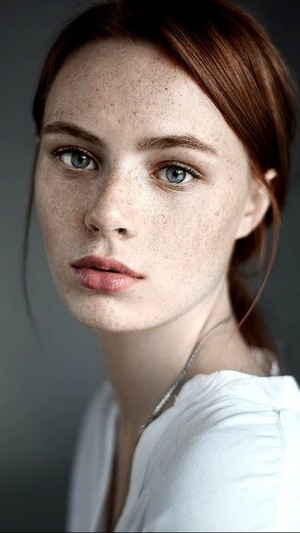  Beautiful Redhead girl with freckles