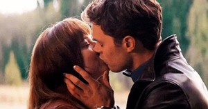 Christian and Ana kiss