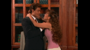  María and Luis Fernando kiss