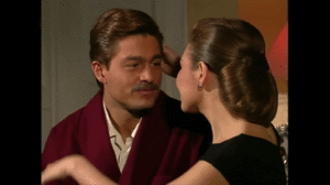  María and Luis Fernando kiss